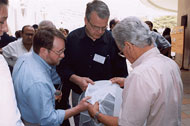 Craig Withers examines a water filter.